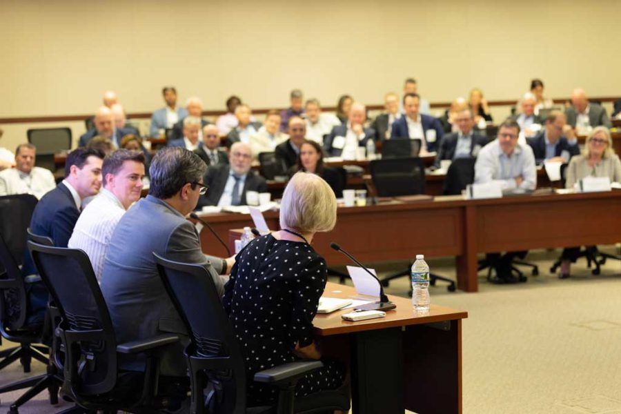 1-panel-with-audience-in-background