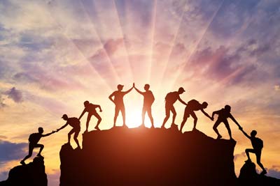 Team work on a hill top