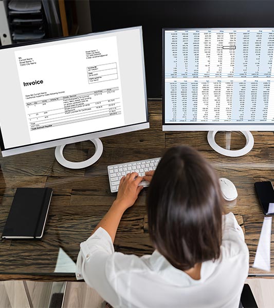 woman looking at electronic invoice