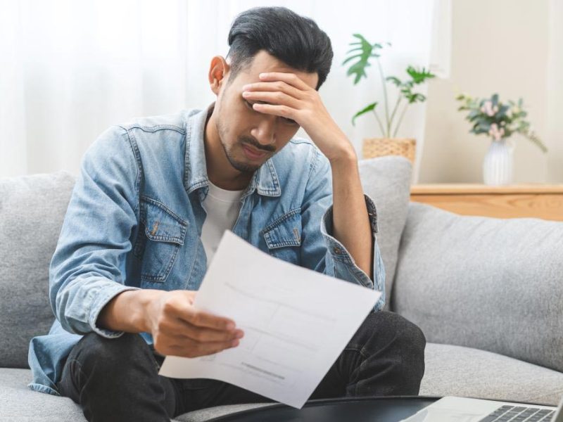 Man looking at paper