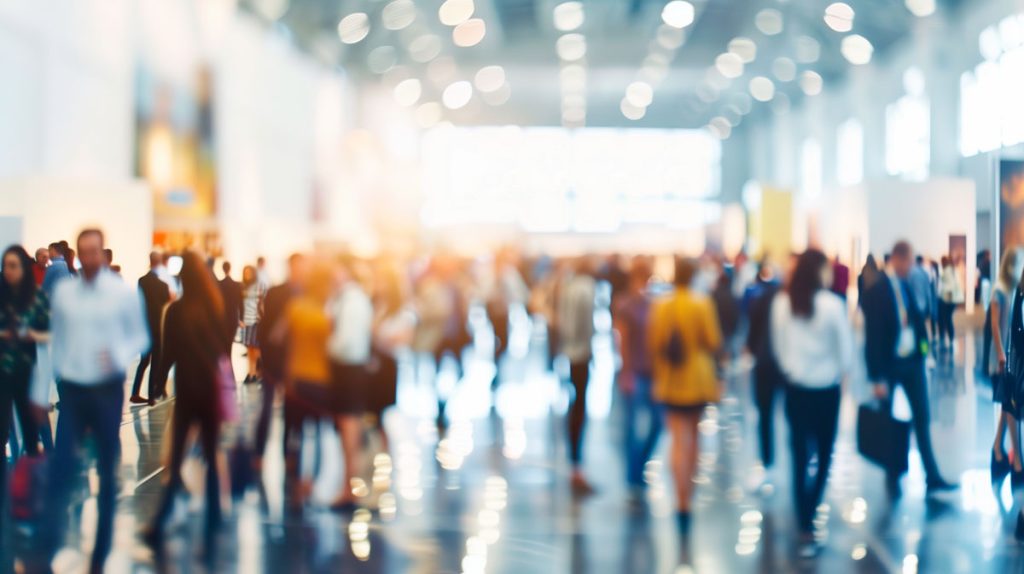 people walking in a conference hall