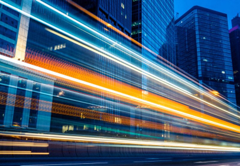 City background with moving lights