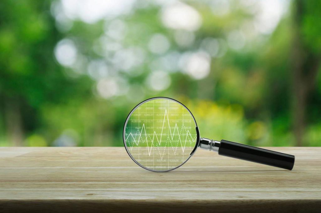 Magnifying glass showing a graph